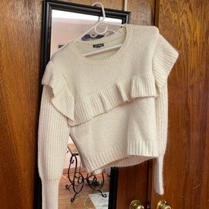 White ruffle sweater